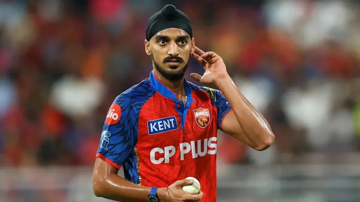 โศกนาฏกรรมสีผิวกลางสนามหญ้า: Arshdeep Singh กับถ้อยคำอื้อฉาวถึง Tilak Varma ในศึก IPL 2026
